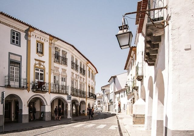 City street in Portugal with white buildings