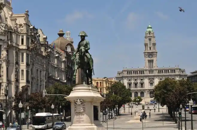 the square in Aliados in Porto with people and cars