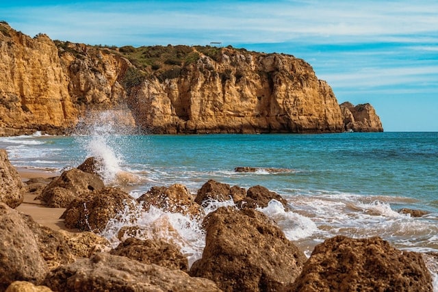 lagos portugal beach with cliffs