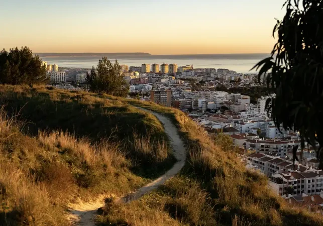 a hill overlooking a city in Portugal near the beach