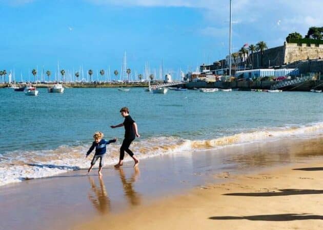 people living in Cascais, Portugal at the beach