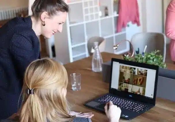 people looking for Portugal short-term rentals on a laptop