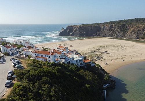 a view of an exclusive real estate in Portugal at the beach