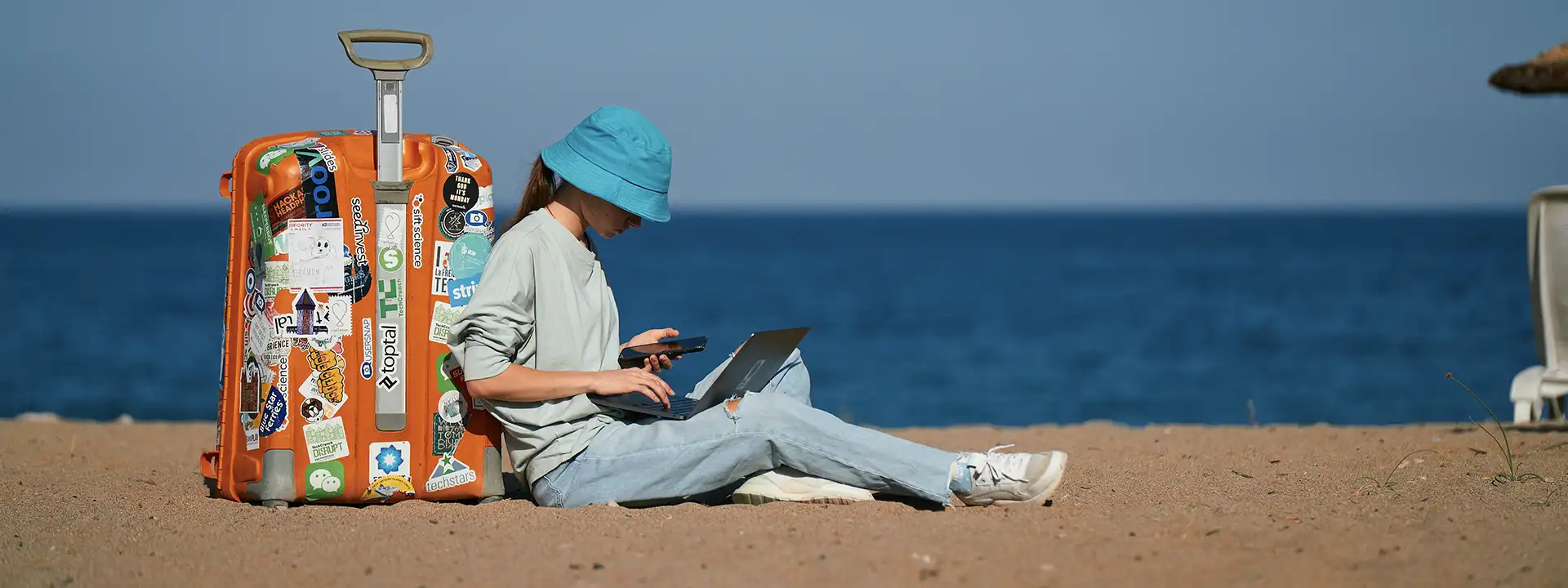a man researching portugal real estate investment on laptop